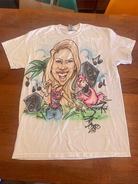So M T-shirt airbrushed caricature of a blonde woman next to a pink flamingo